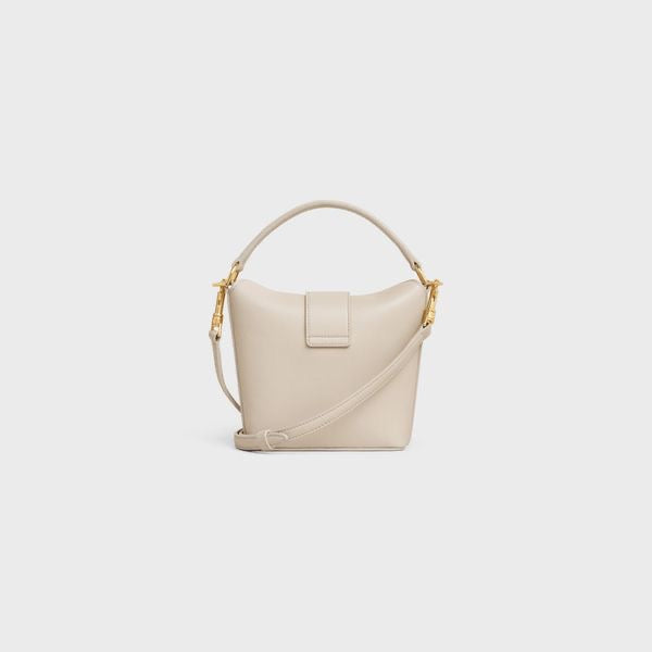 CELINE MINI BUCKET TRIOMPHE IN SMOOTH CALFSKIN LIGHT STONE