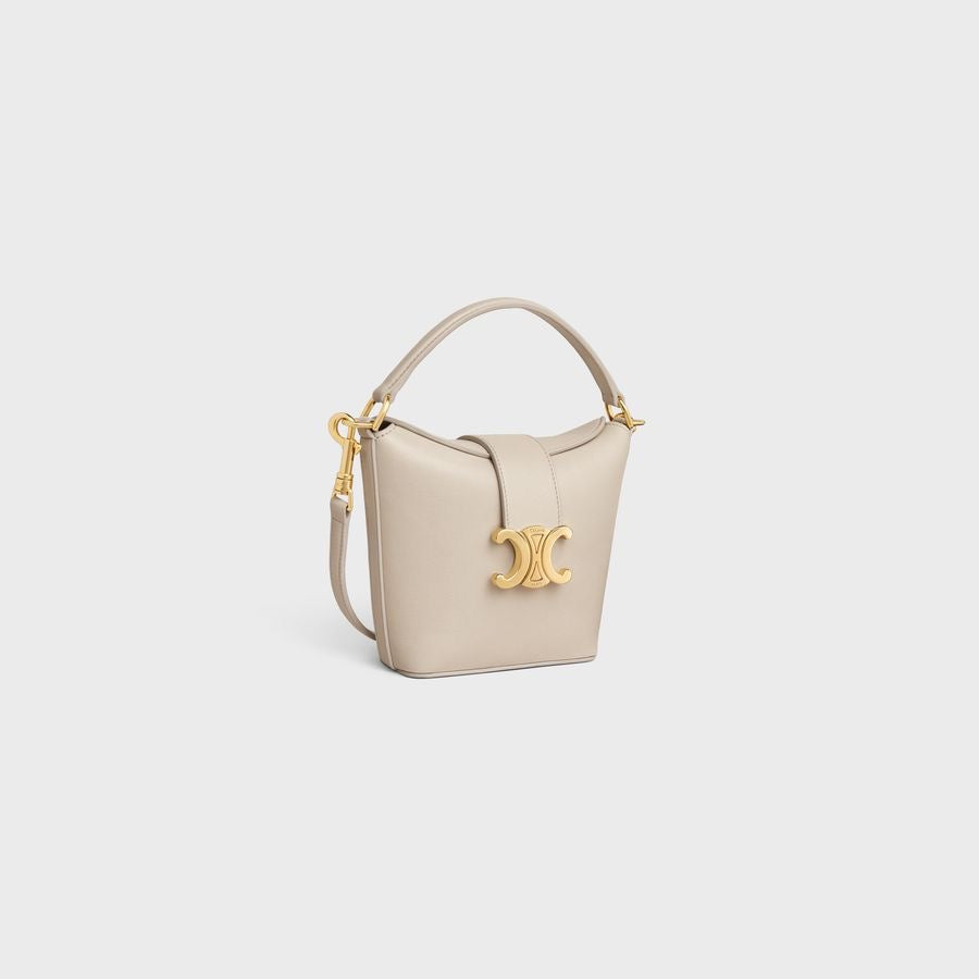 CELINE MINI BUCKET TRIOMPHE IN SMOOTH CALFSKIN LIGHT STONE